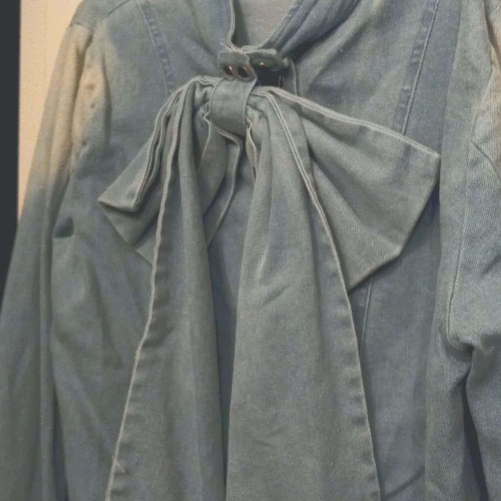 Blue Jean top with  a bow in front